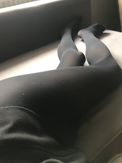 Crossdresser in black pantyhose