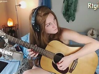 cute skinny tgirl play guitar for her fans