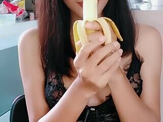 Ladyboy Meena Enjoying a Banana